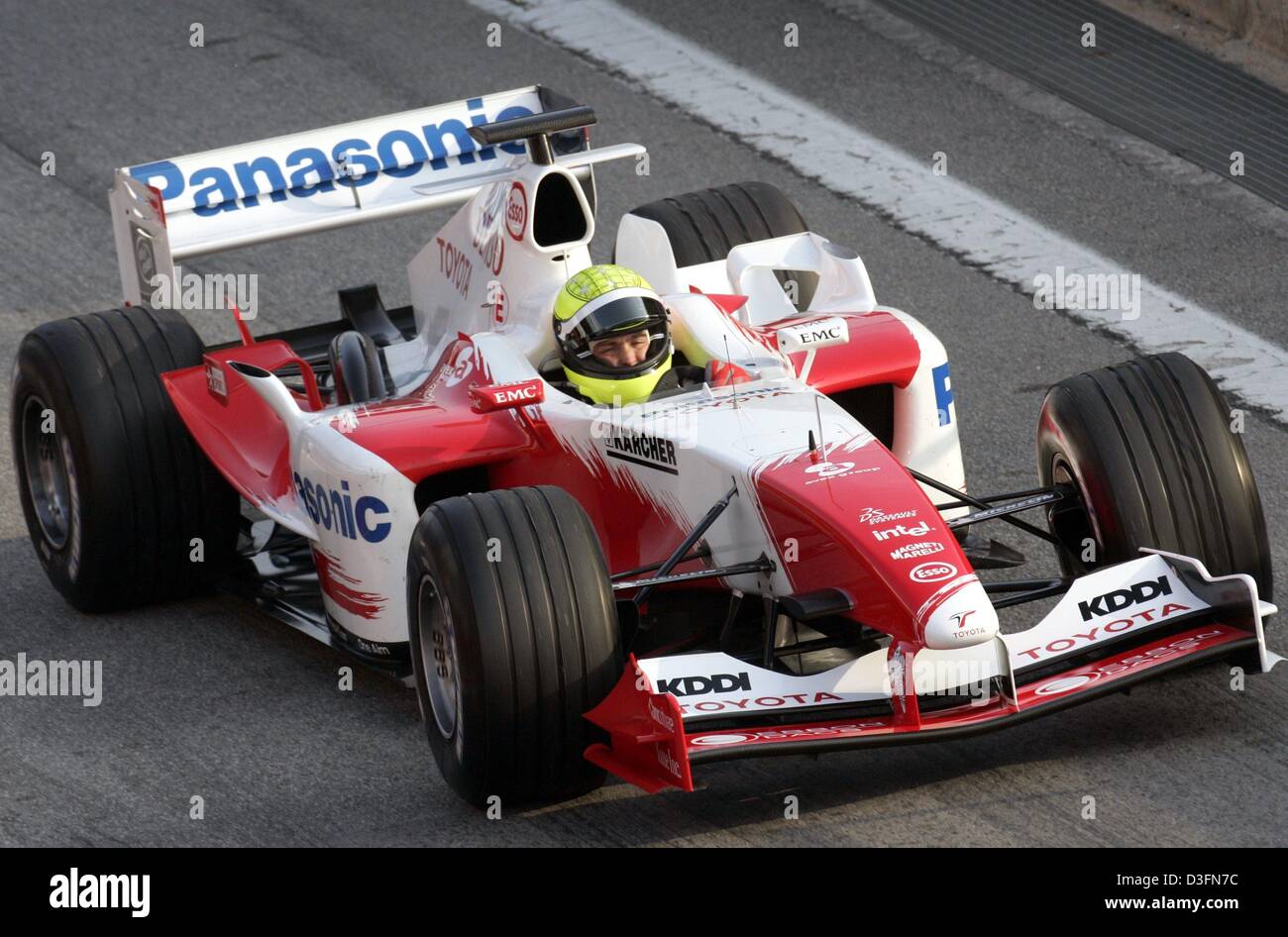 dpa) - German Formula 1 driver Ralf Schumacher drives in a Toyota race car  at the Circuit de Catalunya race course in Barcelona, Spain, 25 November  2004. Schumacher, who is still under