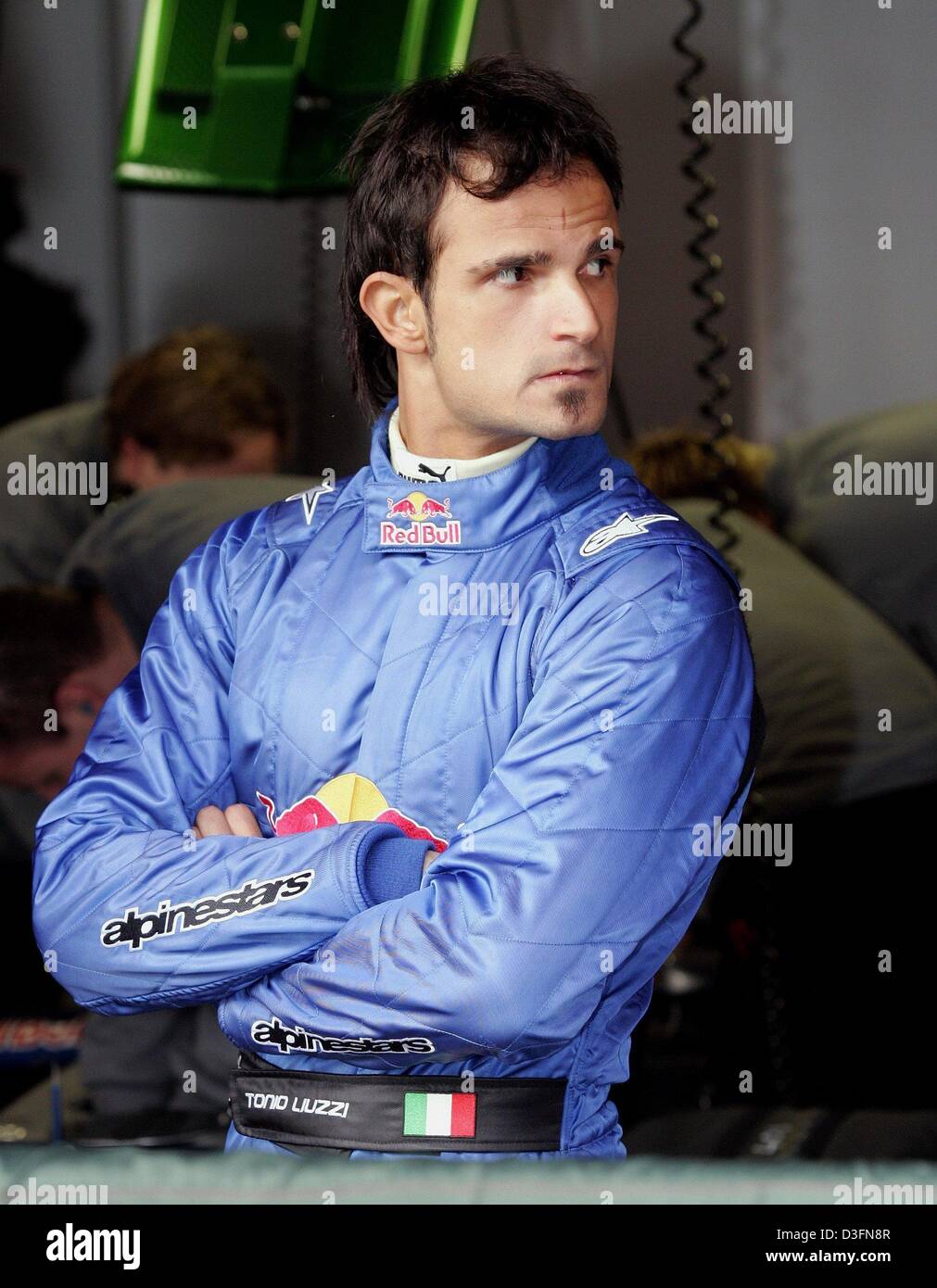 (dpa) - Italian Formula 1 pilot Vitantonio Liuzzi stands in the box of the new Red Bull F1 racing team at the Circuit de Catalunya race course in Barcelona, Spain, 24 November 2004. The new team, which emerged from the Jaguar team, will be part of Formula One in 2005. Stock Photo