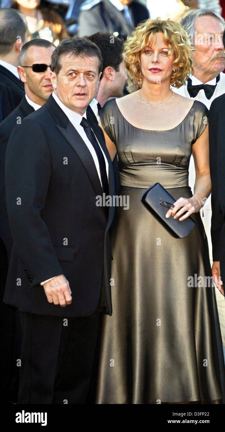 (dpa) - French director and this year's chairman of the jury Patrice Chereau and US actress Meg Ryan, who is also a member of this year's jury, arrive at the opening gala of the 56th International Filmfestival in Cannes, France, 14 May 2003. The first film which was officially selected by the jury and presented to the audience was the French production 'Fanfan la tulipe'. 20 films  Stock Photo