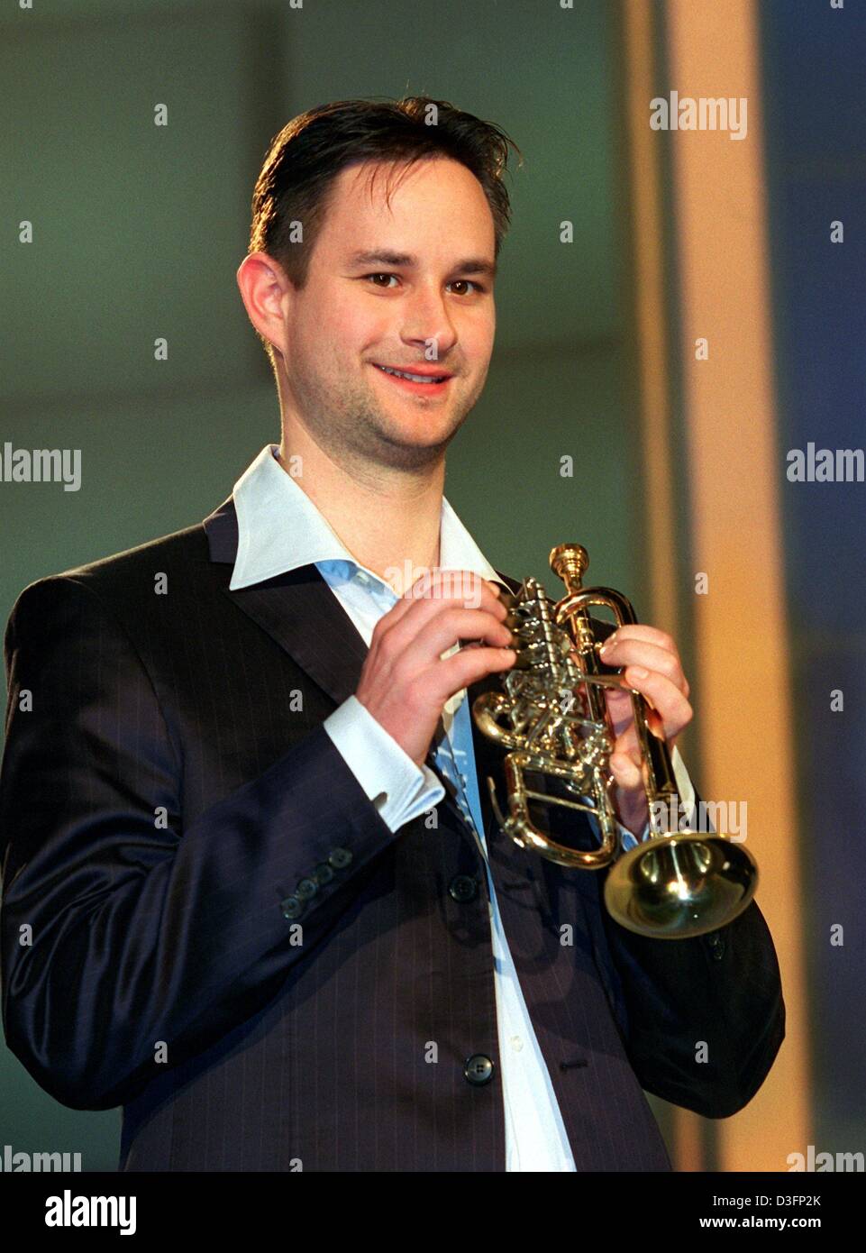 dpa) - Hungarian trumpet player Gabor Boldoczki poses with his trumpet in  Berlin, 4 March 2003. Last year, the 27-year-old musician had presented his  debut CD Stock Photo - Alamy