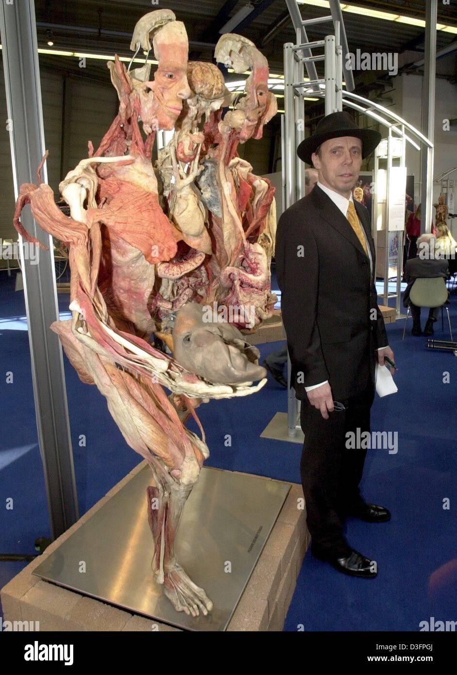 (dpa) Professor Gunther von Hagens is standing in front of a