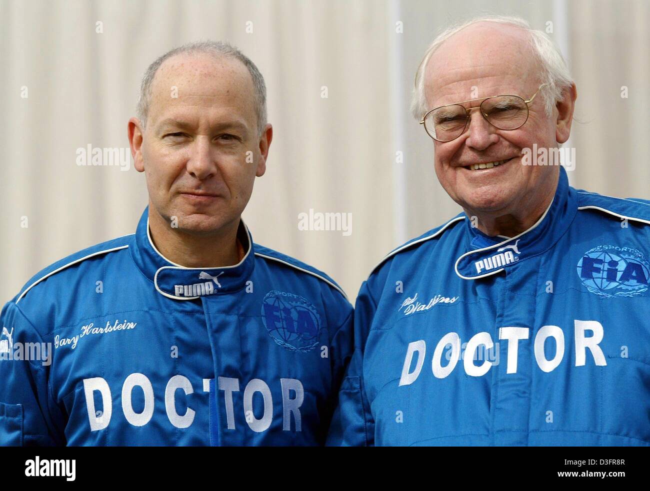 (dpa) -Gary Hartstein (L) and Sid Watkins, medical doctors at the formula one race stand together during the Spanish formula one Grand Prix on the Circuit de Catalunya in Barcelona, Spain, 4 May 2003. Stock Photo