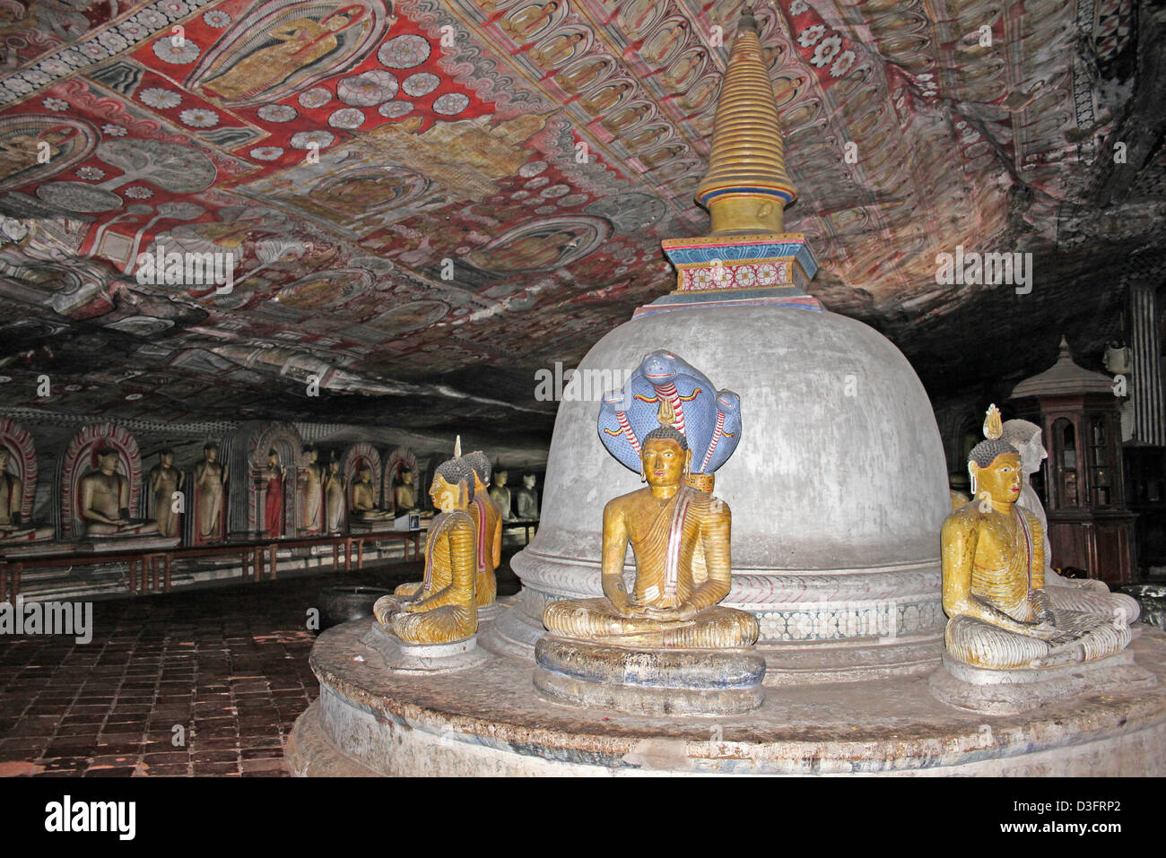 Dagoba and the Buddha images at Maharajalena Cave Temple Stock Photo
