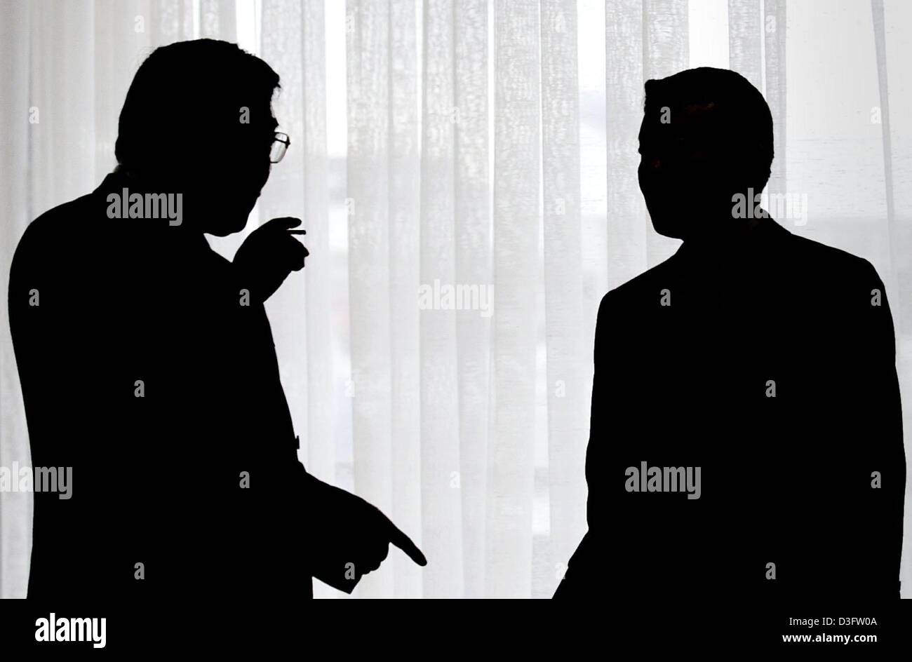 Dpa The Silhouettes Of Minoru Harada L President Of Honda Stock Photo Alamy