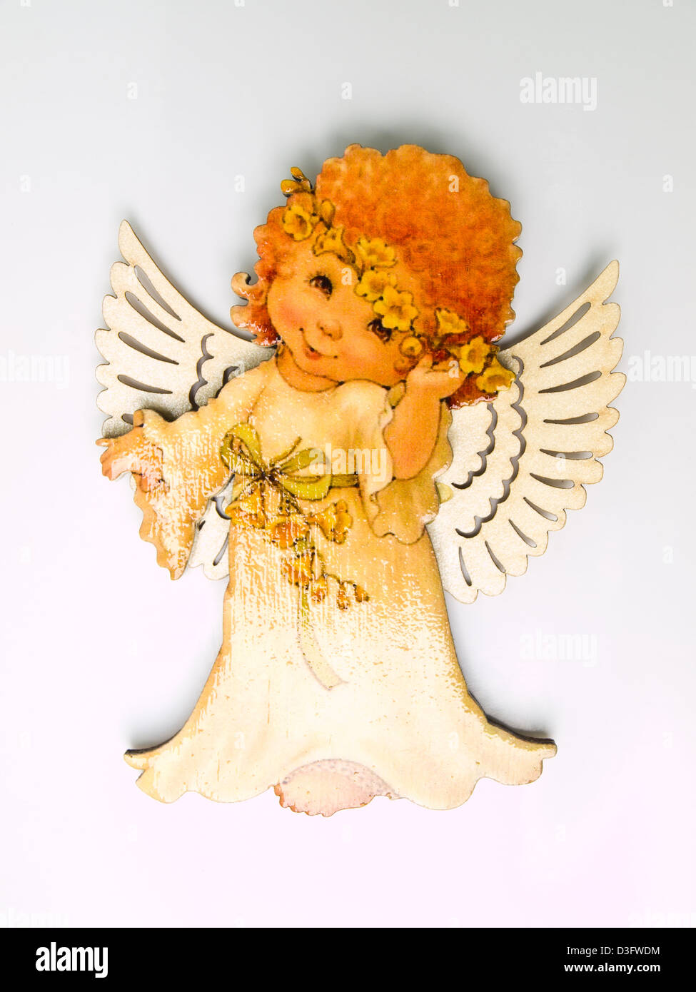 A child angel magnet isolated on white background Stock Photo