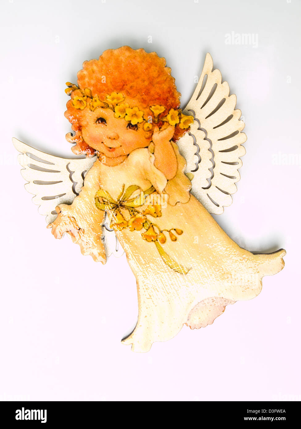 A child angel magnet isolated on white background Stock Photo