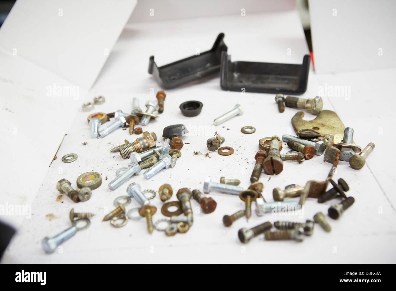 Screws and nuts at auto repair shop Stock Photo