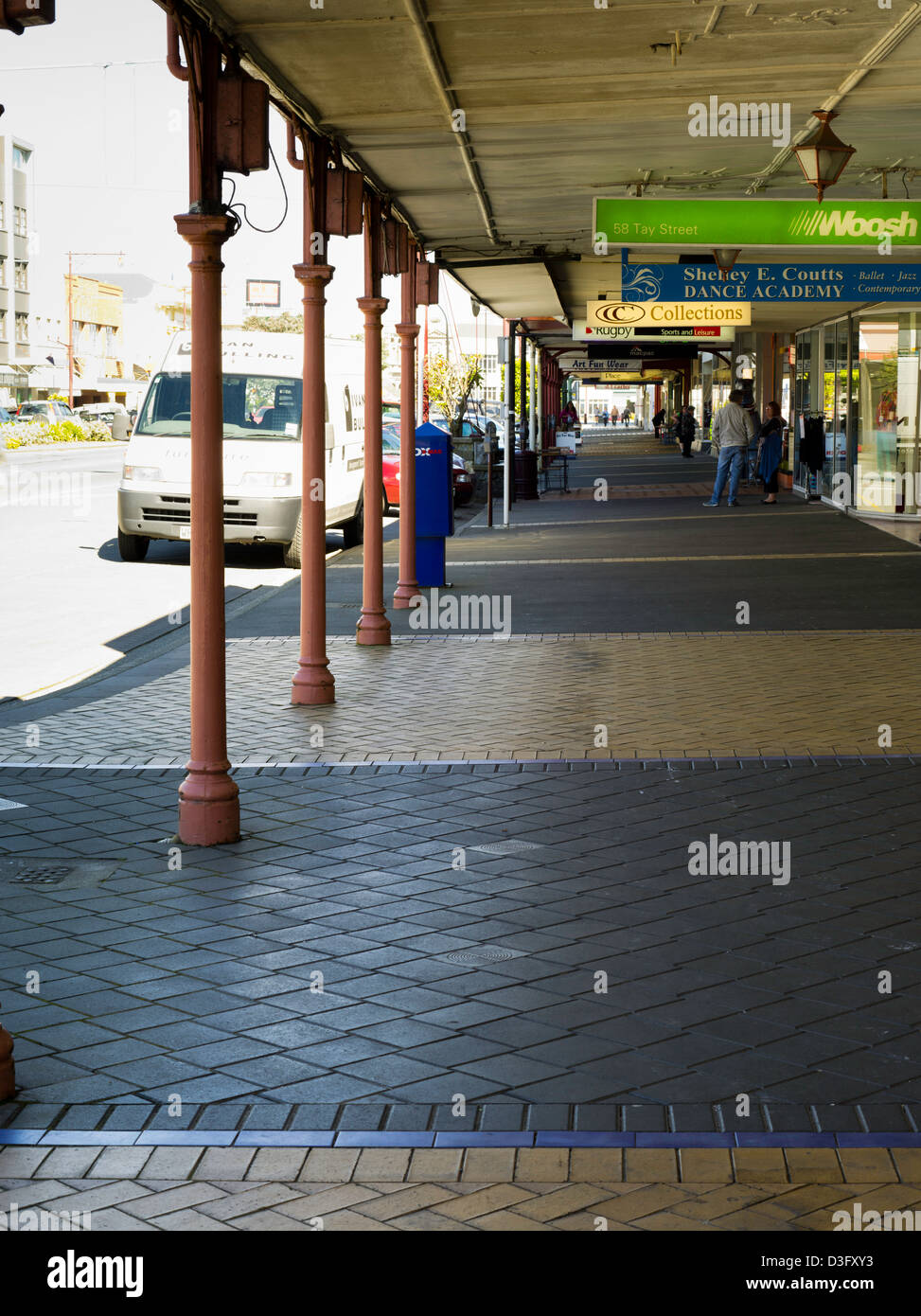 A covered walkway along Tay Street in the Central Business District of Invercargill, New Zealand, as protection against rain and Stock Photo