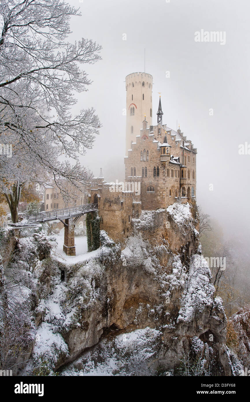 The beautiful and romantic Schloss Lichtenstein in the Swabian Alps, Germany sits perched on a precipice on a cold day in winter Stock Photo