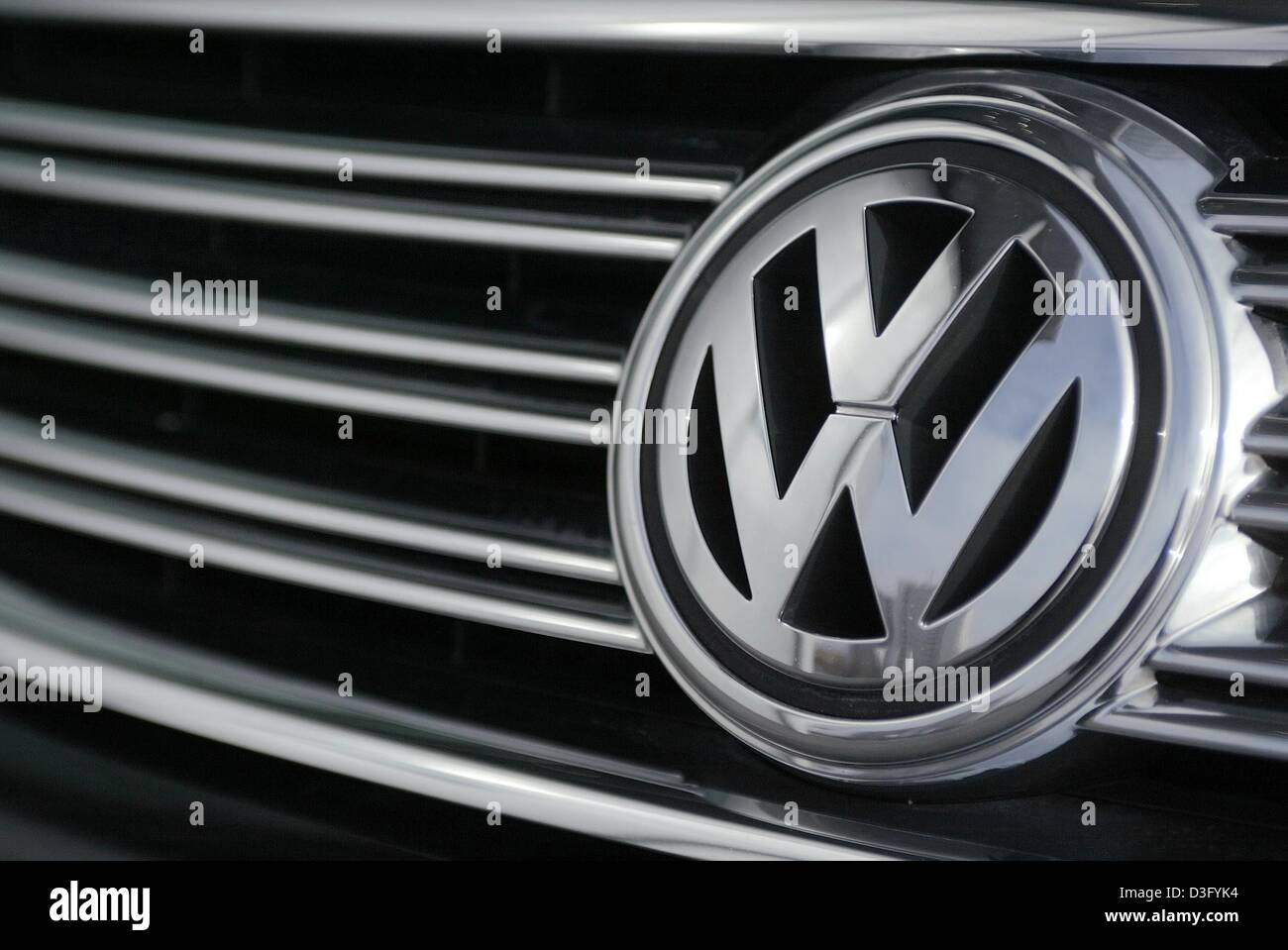 dpa) - The Volkswagen logo (VW) decorates the radiator grill of a