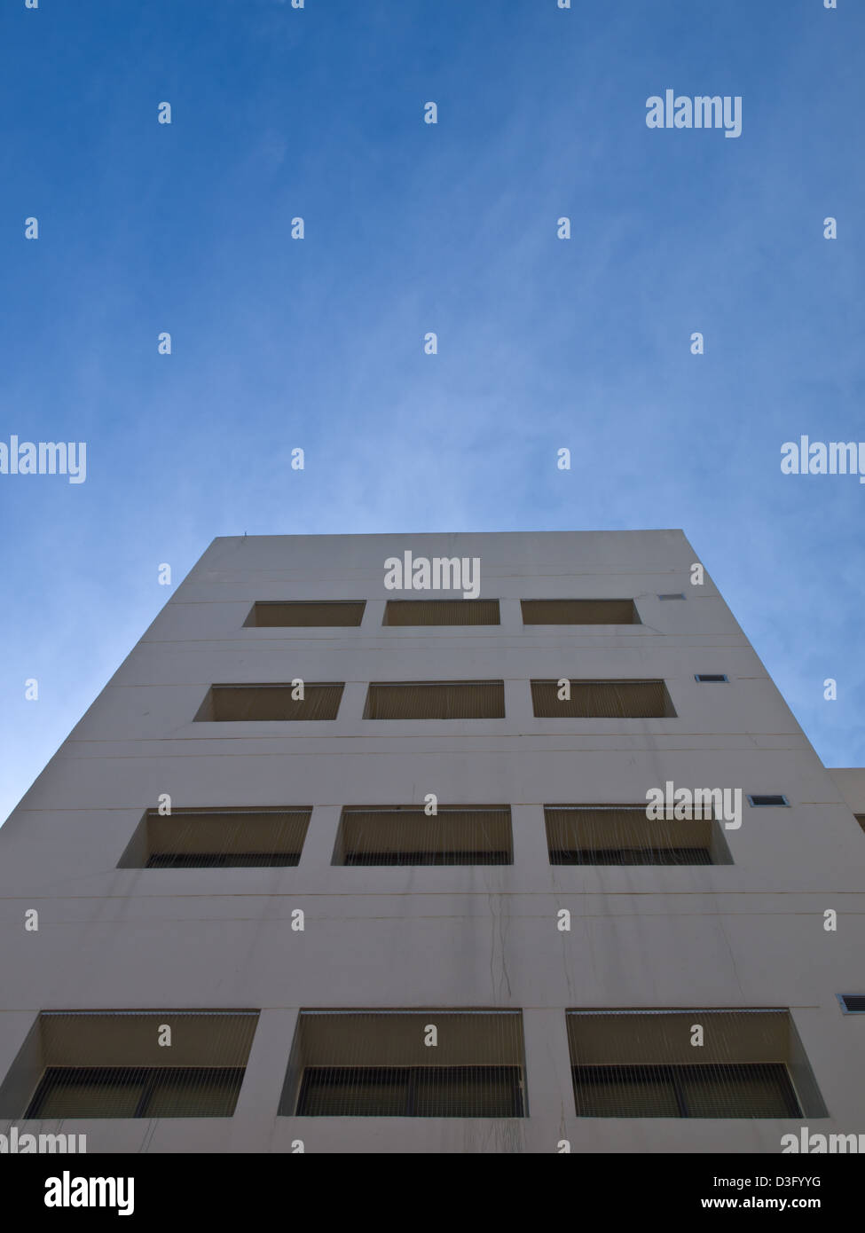Facade windows of office building on blue sky Stock Photo - Alamy
