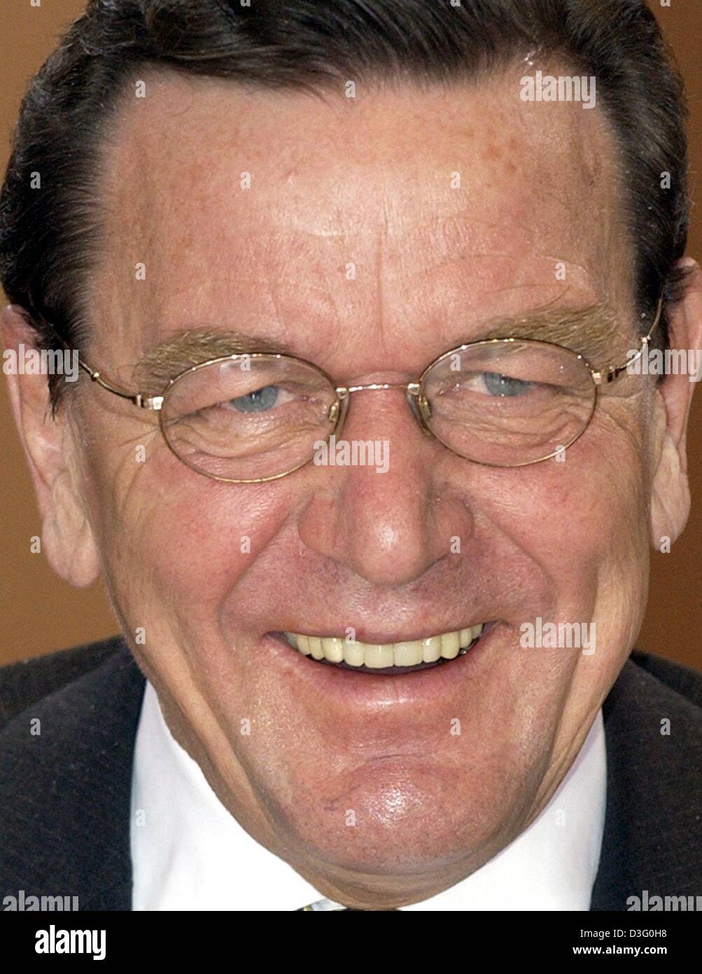 (dpa) - German Chancellor Gerhard Schroeder smiles prior to a meeting ...