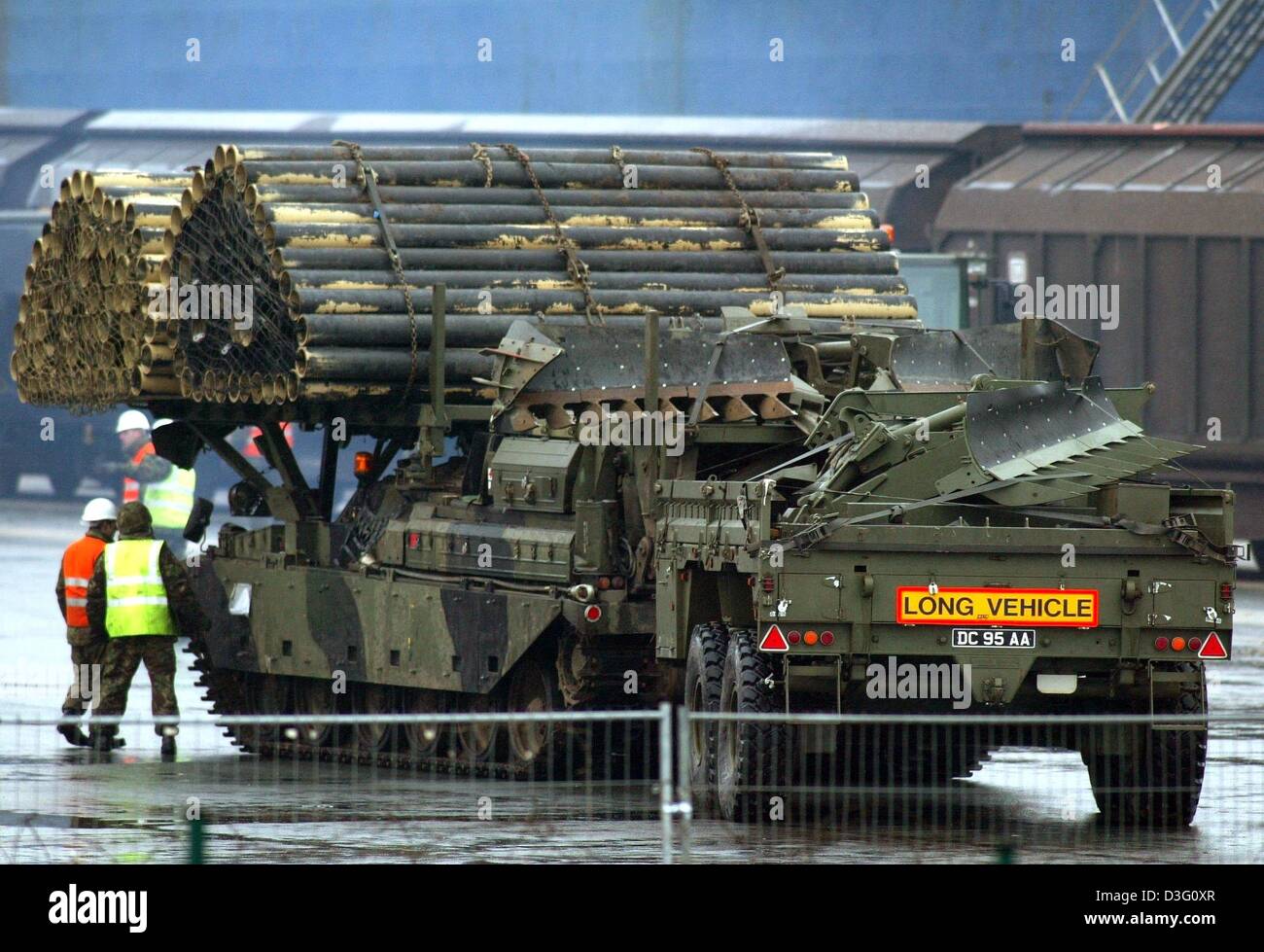 (dpa) - A British tank waits to be loaded onto a cargo ship at the harbour in Emden, Germany, 2 February 2003. This tank belongs to the British military equipment stationed in Germany. It is sent for precautionary reasons to the Gulf region in the context of the conflict with Iraq. Stock Photo