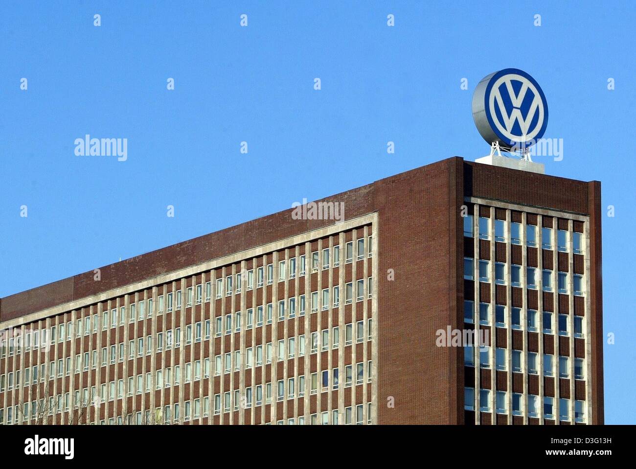 dpa) - A view of Volkswagen's (VW) company logo atop an office building at VW  headquarters in Wolfsburg, Germany, 23 February 2003 Stock Photo - Alamy