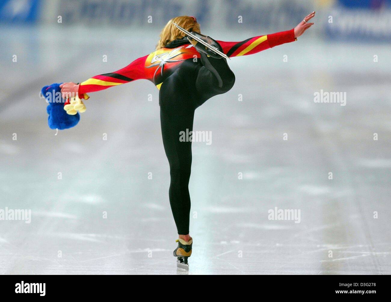 (dpa) - German speed skater Claudia Pechstein gracefully skates on one leg as she jubilates after crossing the finish line of the women's 3000m race at the speedskating single distances world championships in Berlin, 15 March 2003. She wins second place clocking 4:07.99 minutes. Stock Photo