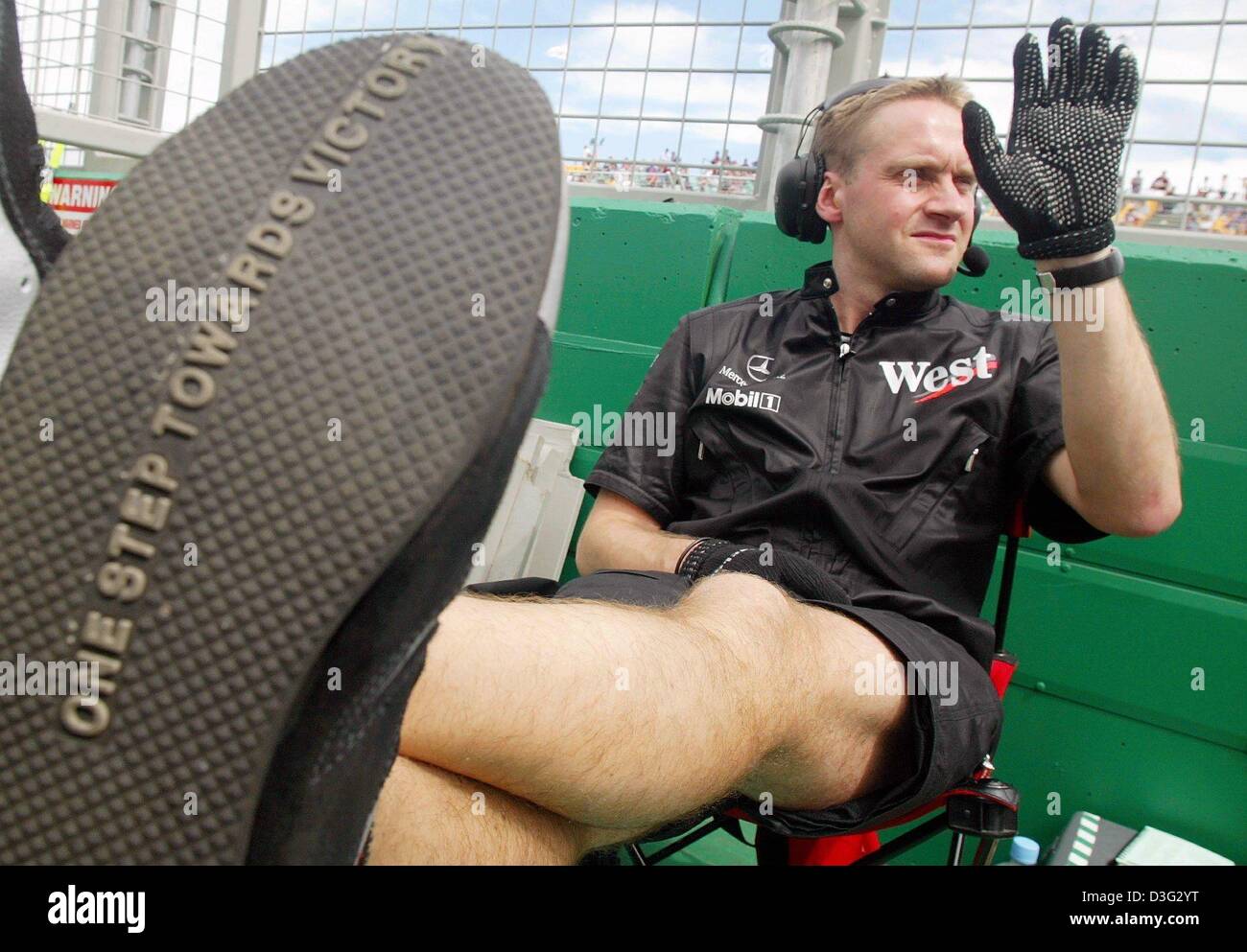 (dpa) - The slogan 'One step towards victory' is seen on the sole of a mechanic of the McLaren-Mercedes team on the Albert Park race track in Melbourne, 7 March 2003. The Australian Grand Prix will kick off the formula one season on 9 March 2003 in Melbourne. Stock Photo