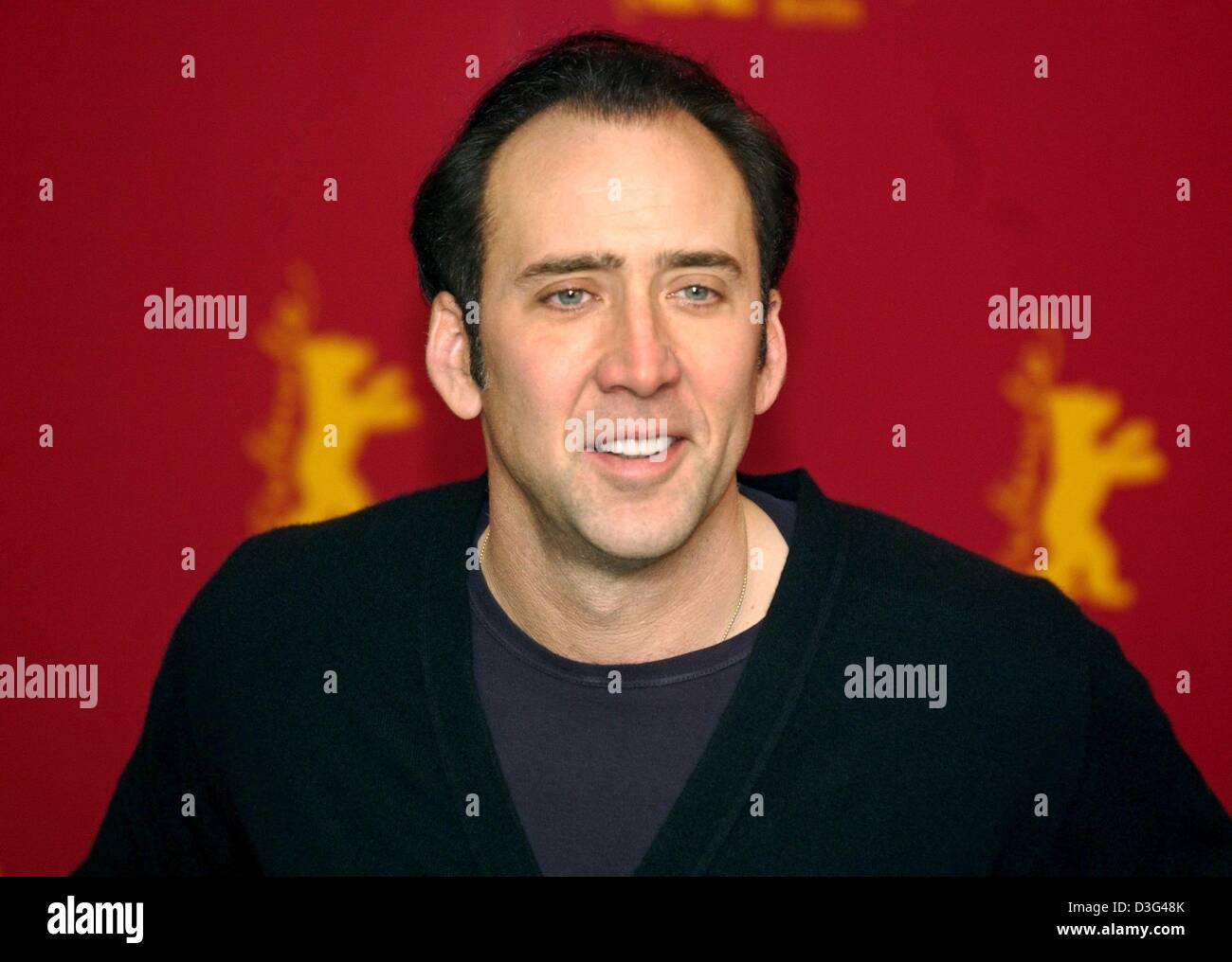 (dpa) - US actor Nicolas Cage, pictured during the screening of his latest movie 'Adaptation' at the 53rd annual film festival in Berlin, 8 February 2003. The film, in which Cage plays a pair of twin brothers, is a satire and a black comedy about Hollywood in which reality and fiction become blurred. The film runs in competition for the Golden Bear awards. Stock Photo