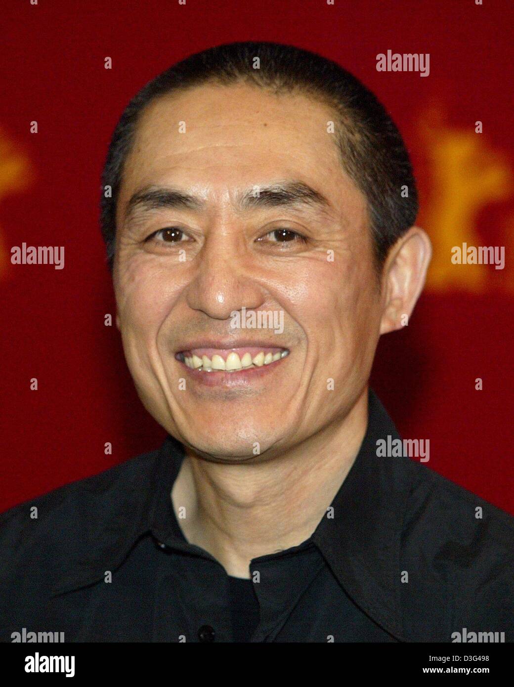 (dpa) - Chinese film director Zhang Yimou smiles during the press conference for his latest film, 'Ying Xiong' ('Hero') at the 53rd annual film festival in Berlin, 7 February 2003. The film runs in competition at the Berlinale festival. Stock Photo