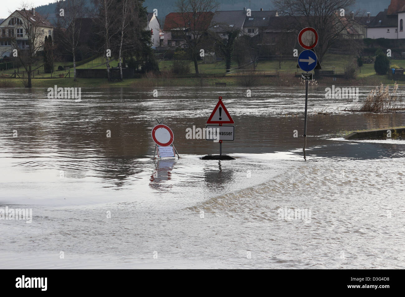 Stadtprozelten suffers regular flooding of main roads through the town. Flood warnings are erected to warn the population. Stock Photo