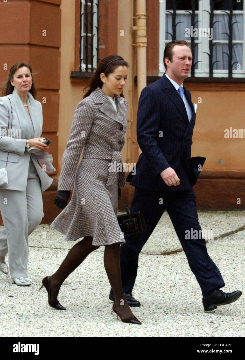 (dpa) - Mary Donaldson, the fiancee of Crown Prince Frederik of Denmark, and Prince Gustav von Berleburg arrive for the baptism of Countess Ingrid at Berleburg Castle in Bad Berleburg, Germany, 13 December 2003. The baby was born on 16 August 2003 in Copenhagen and was given the name Countess Ingrid Alexandra Irma Astrid Benedikte von Pfeil and Klein-Ellguth. Her parents are Jeffer Stock Photo