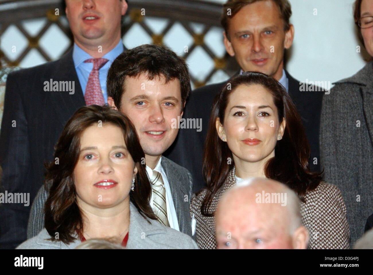 (dpa) - Crown Prince Frederik of Denmark and his fiancee Mary Donaldson pose for a group photo after the baptism of Countess Ingrid at Berleburg Castle in Bad Berleburg, Germany, 13 December 2003. On the left Princess Alexia of Greece. The baby was born on 16 August 2003 in Copenhagen and was given the name Countess Ingrid Alexandra Irma Astrid Benedikte von Pfeil and Klein-Ellguth Stock Photo