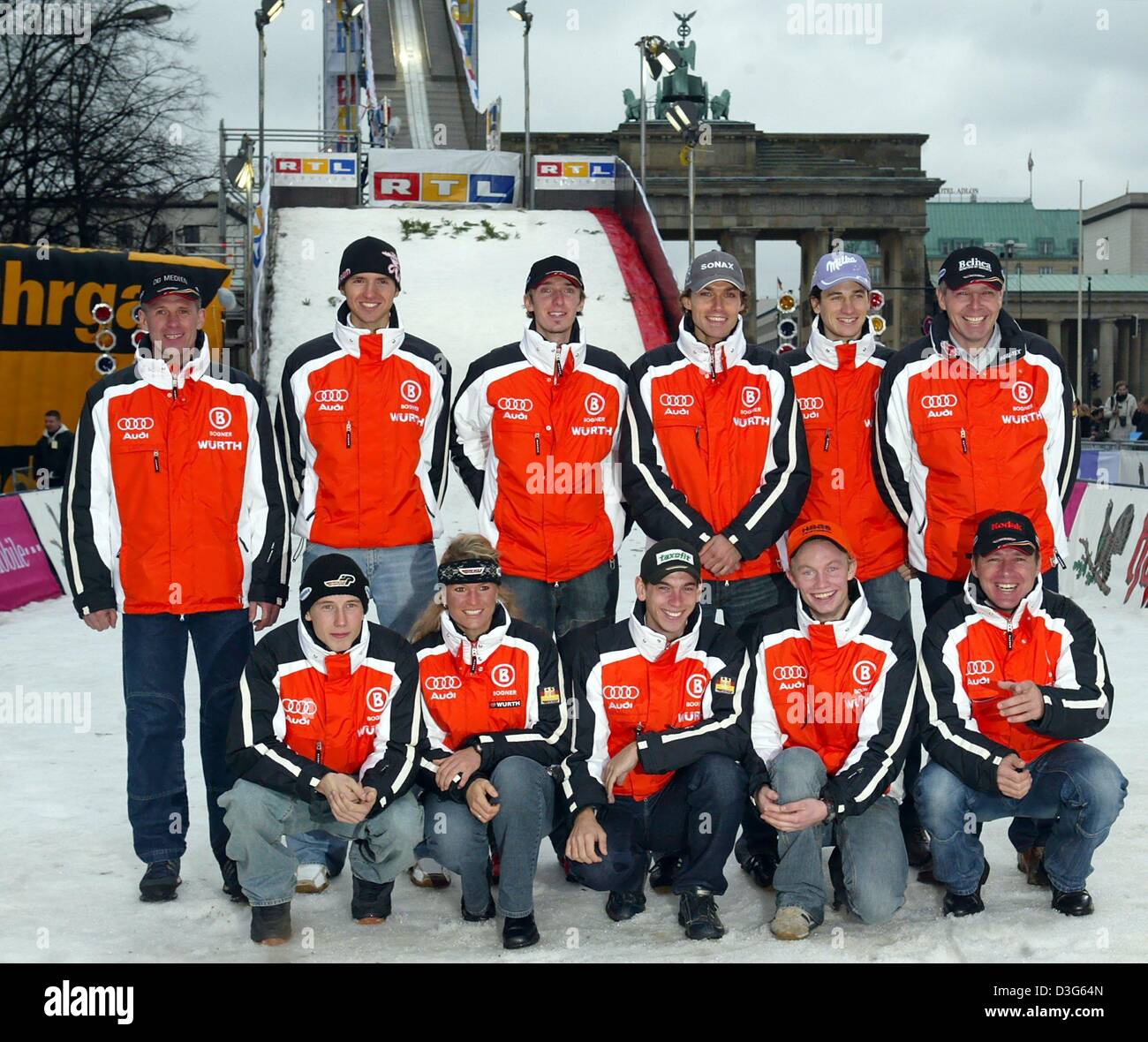 (dpa) The members of the German team SkiAdler (eagle) pose for a group picture in front of a