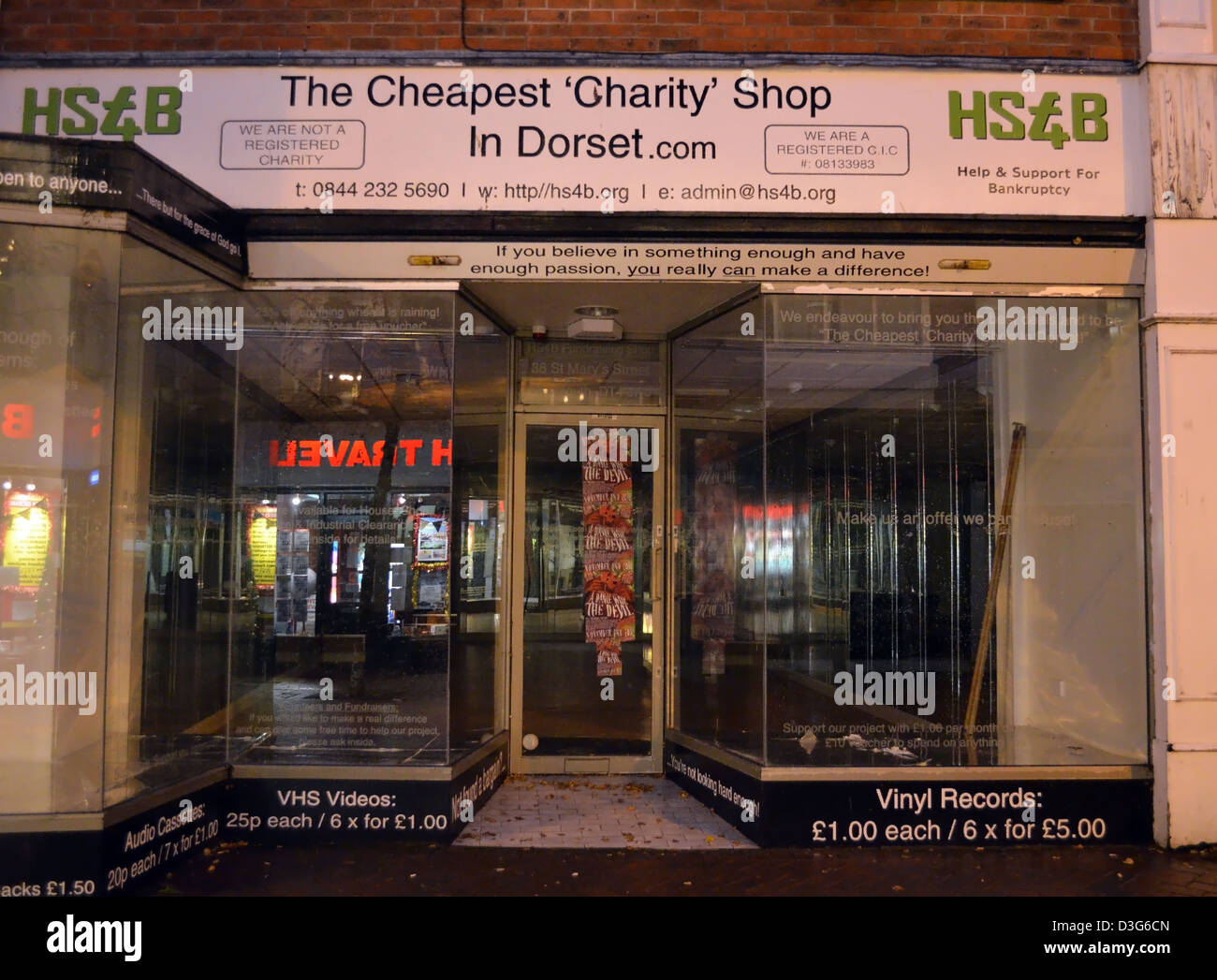 Cheap Charity Shop That s Now Empty Stock Photo Alamy