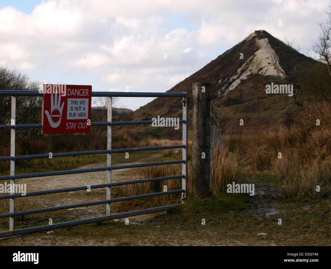 Danger sign on gate at Cornish china clay mining area, Cornwall, UK Stock Photo