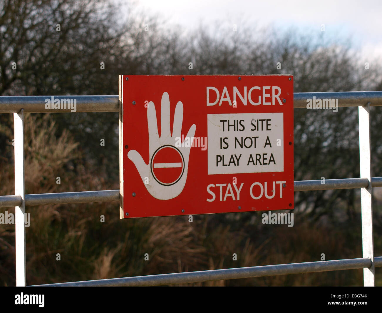 Danger sign on gate at Cornish china clay mining area, Cornwall, UK Stock Photo