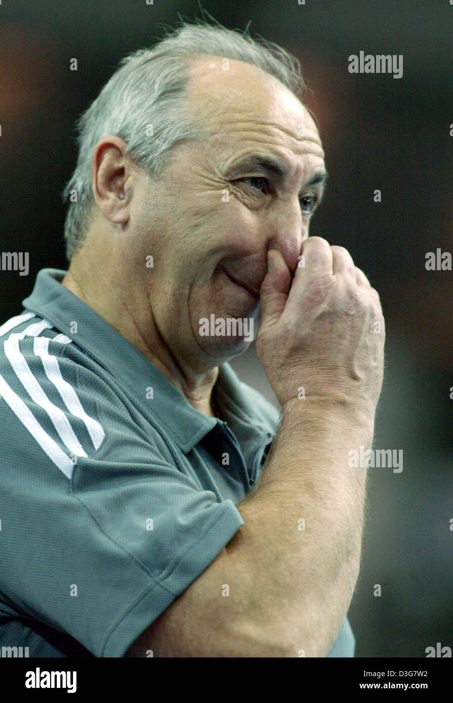dpa) - Russian handball coach Vladimir Maximov touches his nose during a  Supercup game in Leipzig, Germany, 30 October 2003 Stock Photo - Alamy