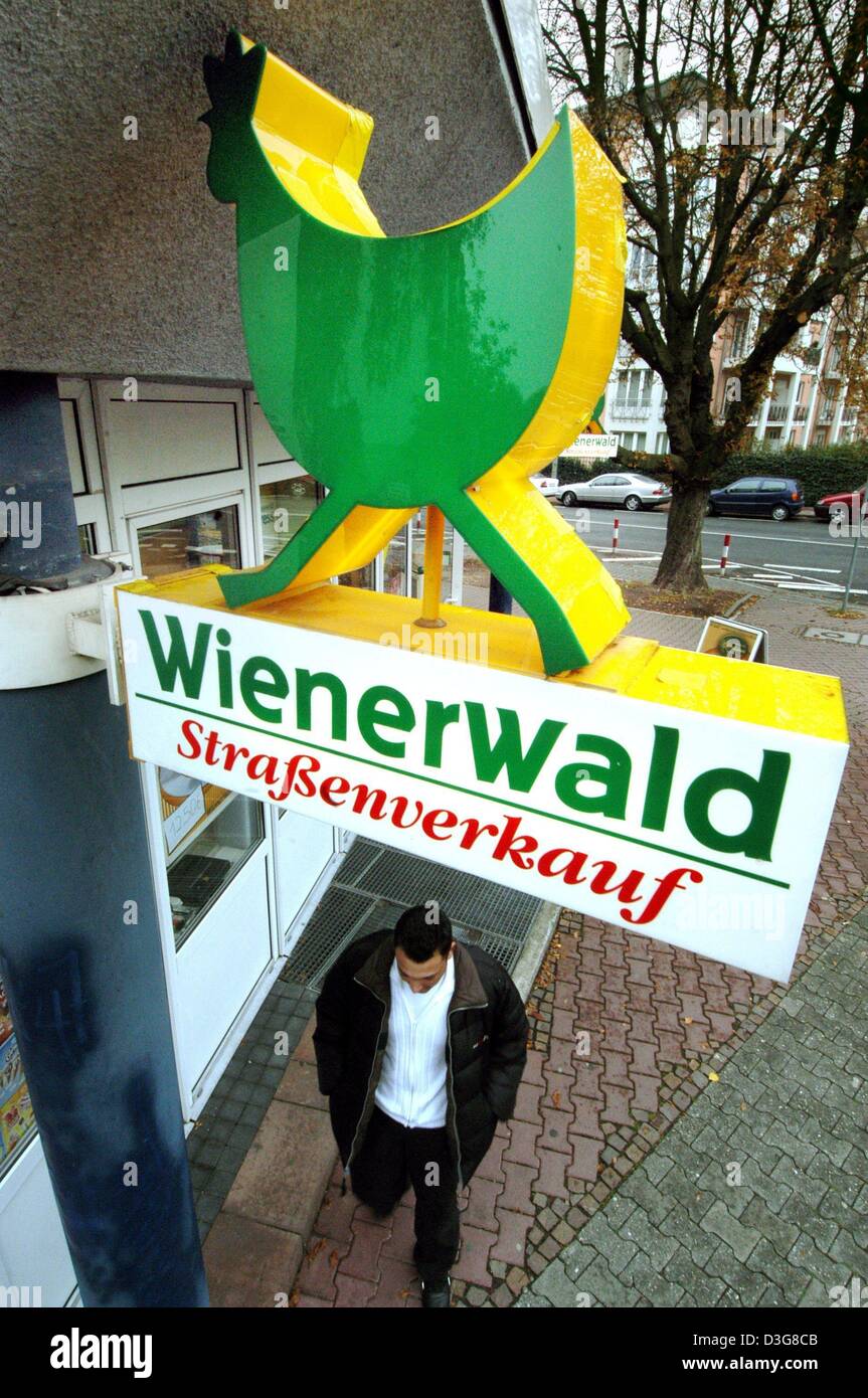 (dpa) - A man passes a Wienerwald (Vienna forest) restaurant in Frankfurt, 22 October 2003. The insolvent restaurant chains might be rescued. According to the insolvency administrator a rescue plan will be presented this week, which might end the fight for the brand rights. Additionally, a new investor will provide the financial backing for an expansion of the company. Stock Photo