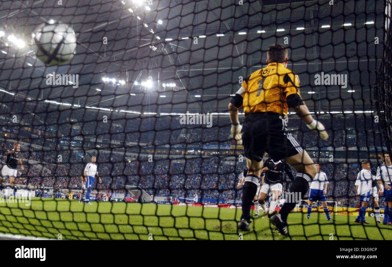 (dpa) - The ball is in the net after Schalke's goalie Frank Rost could not save a free kick from Basel's Matias Emilio Delgado during the UEFA Cup group game opposing German side Schalke 04 and FC Basel in Gelsenkirchen, Germany, 21 October 2004. Stock Photo