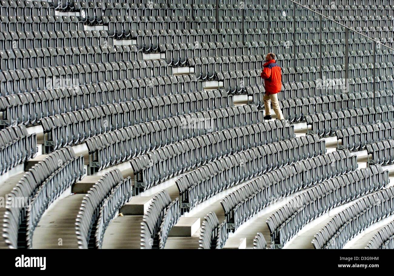 (dpa) - View of the seats at Olympic Stadium in Berlin, Germany, 27 August 2004. The stadium, which was originally built for the infamous 1936 Olympic Games that were used as a propaganda show by the Nazi regime, has been renovated at a cost of 240 million euros. The stadium, which now offers roofed seats for 76,000 spectators, will be the site of the FIFA Soccer World Cup final in Stock Photo