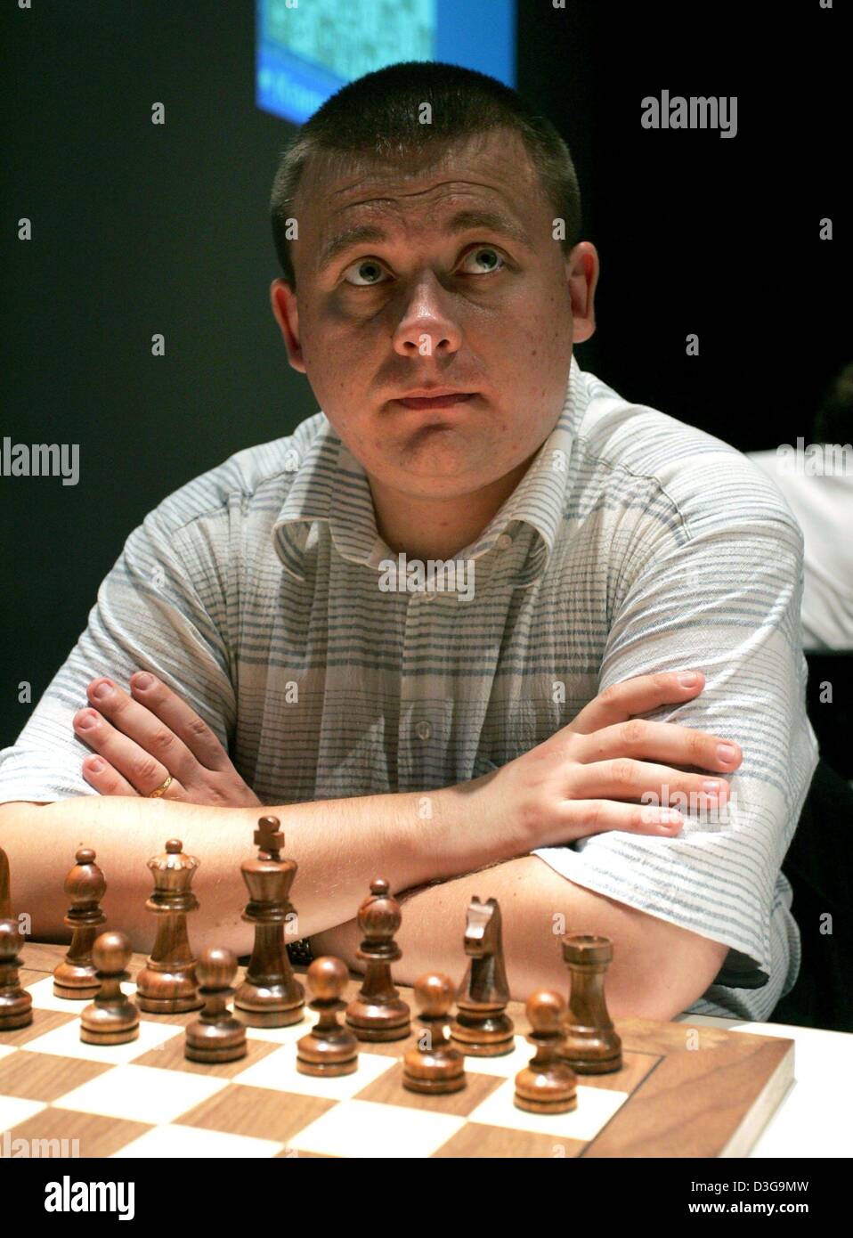 (dpa) - Russian Grandmaster Sergei Rublevski sits in front of a chess board during the 2004 Dortmund Chess Meeting in Dortmund, Germany, 23 April 2004. The event takes place at the Dortmund Theatre from 22 July to 1 August. Stock Photo