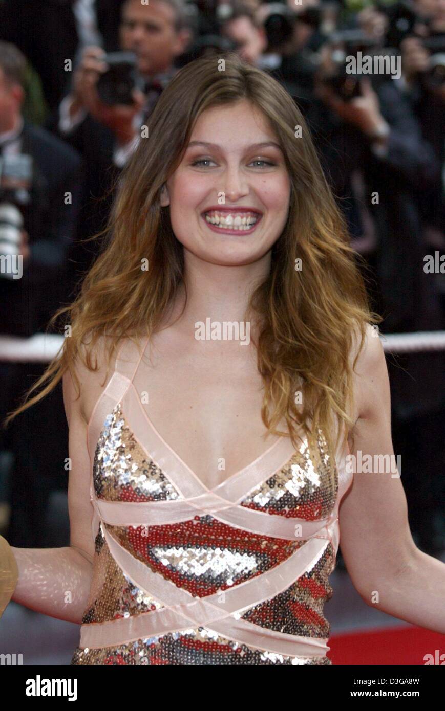 (dpa) - Model and actress Laetitia Casta arrives for the opening of the 57th Film Festival in Cannes, France, 12 May 2004. The Golden Palm awards will be awarded on 22 May. Stock Photo