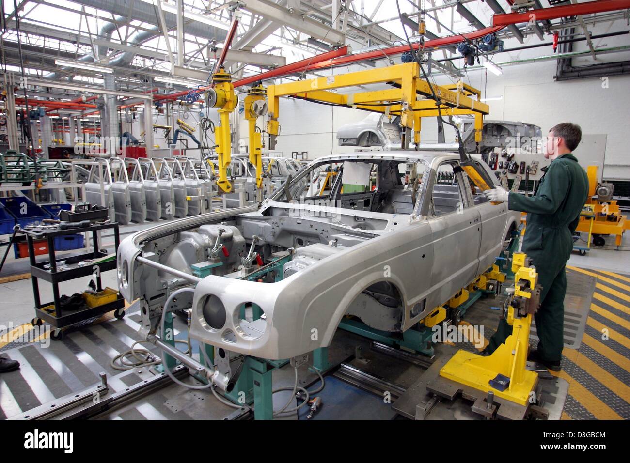 Dpa A Worker In The Production Line Of British