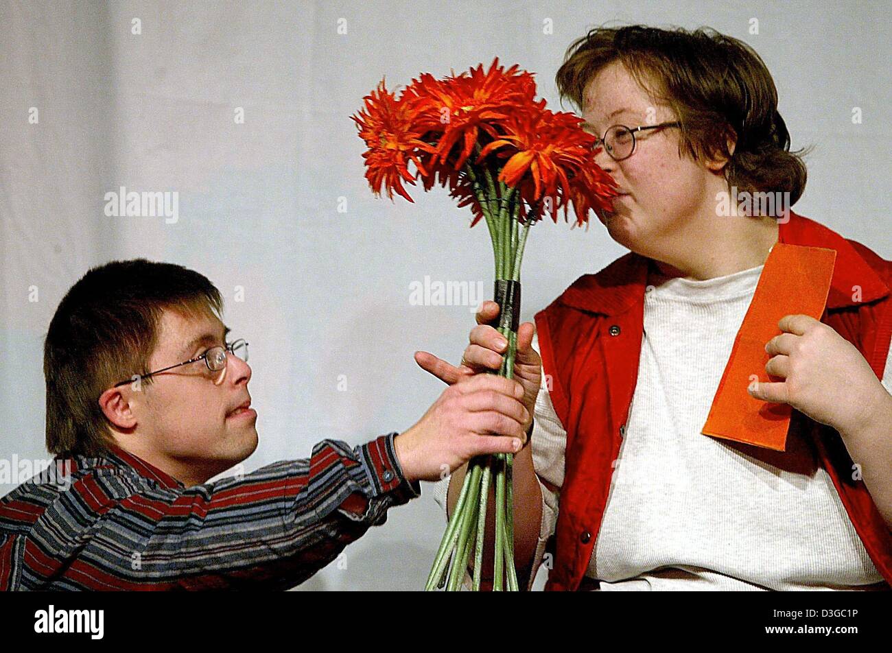 (dpa) - Sebastian Rieder (L) and Antje Heinrich (R) perform in the final rehearsal of the theatre play 'Amora' at the Mainfraenkischen Werkstaetten in Wuerzburg, Germany, 7 October 2004. The theatre group 'Theater Augenblick' celebrates the inauguration of its new stage at the Mainfraenkischen Werkstaetten with the play. The group is one of about a dozen professional theatre groups Stock Photo
