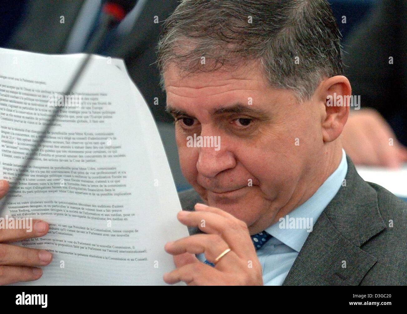 (dpa) - The disputed European Justice, Freedom and Security Commissioner-designate Rocco Buttiglione reads his notes at the European Parliament in Strasbourg, France, 27 October 2004. The European Parliament has, in an unequalled demonstration of power, reshuffled the future EU commission. The incoming European Commission President Jose Manuel Barroso backed down in the case of the Stock Photo