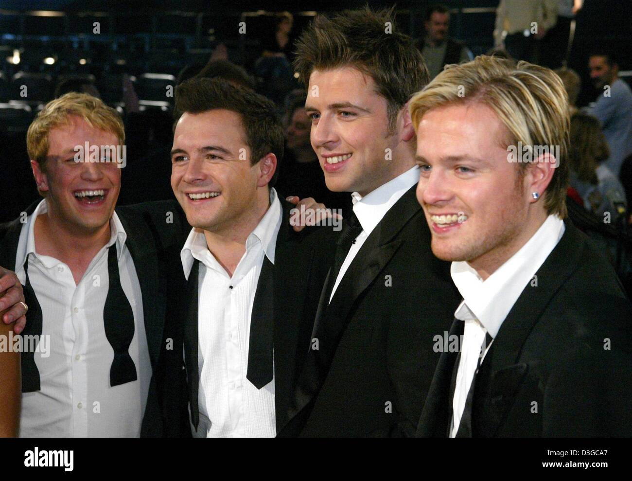 (dpa) - Irish boygroup westlife stands on stage during the first taping of new German TV show 'TARATATA' in Cologne, Germany, 18 October 2004. The show plans to present a broad selection of performances from international music stars. Stock Photo