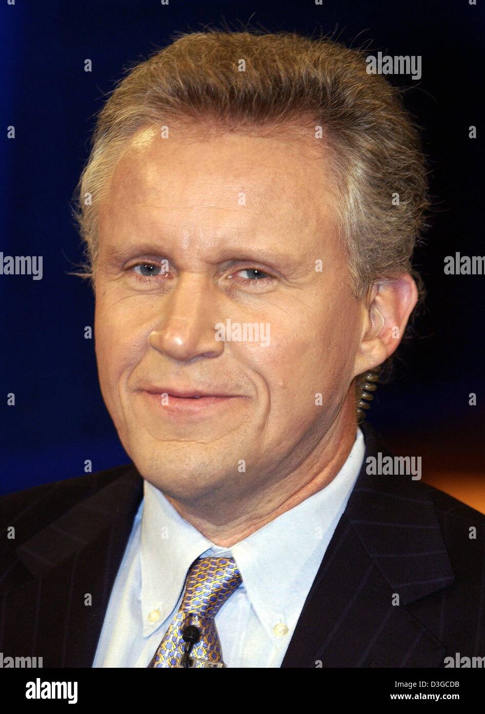 (dpa) - Jeffrey Immelt, chairman of US conglomerate General Electric (GE), smiles during a talk show on German television in Berlin, Germany, 17 October 2004. The television show centred on the dire economic state of the German automotive sector. Stock Photo