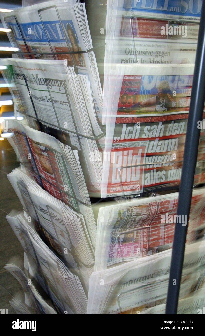 (dpa files) A view of a spinning newspaper stand at a kiosk in Berlin