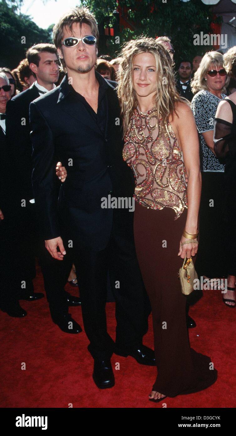 (dpa files) - Hollywood hunk Brad Pitt and his fiancee Jennifer Aniston arrive to the Emmy Awards in Los Angeles, 12 September 1999. The couple, who got married in July 2000, has allegedly split up, the paper 'News of the World' reported on 11 October 2004. The two stars have been living apart for a few months and will go separate ways in the future. Rumour has it that Pitt's film  Stock Photo