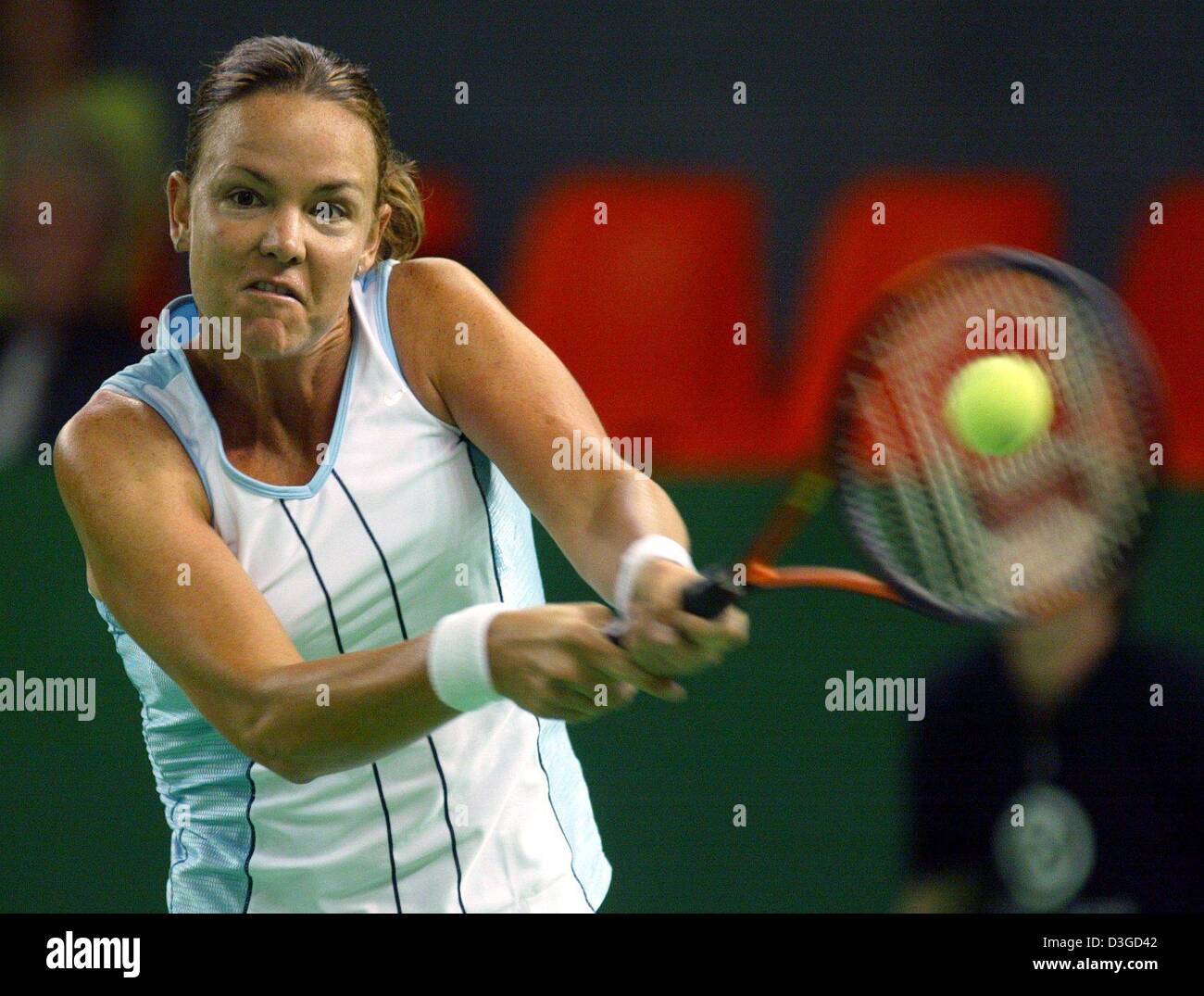 (dpa) - Lindsay Davenport from the USA hits a backhand during her match against Australian Alicia Molik at the Porsche Tennis Grand Prix in Filderstadt near Stuttgart, Germany, 6 October 2004. The prize of the WTA tournament, which runs until Sunday, 10 October, are 650,000 US dollars prize money and a sports car. Stock Photo