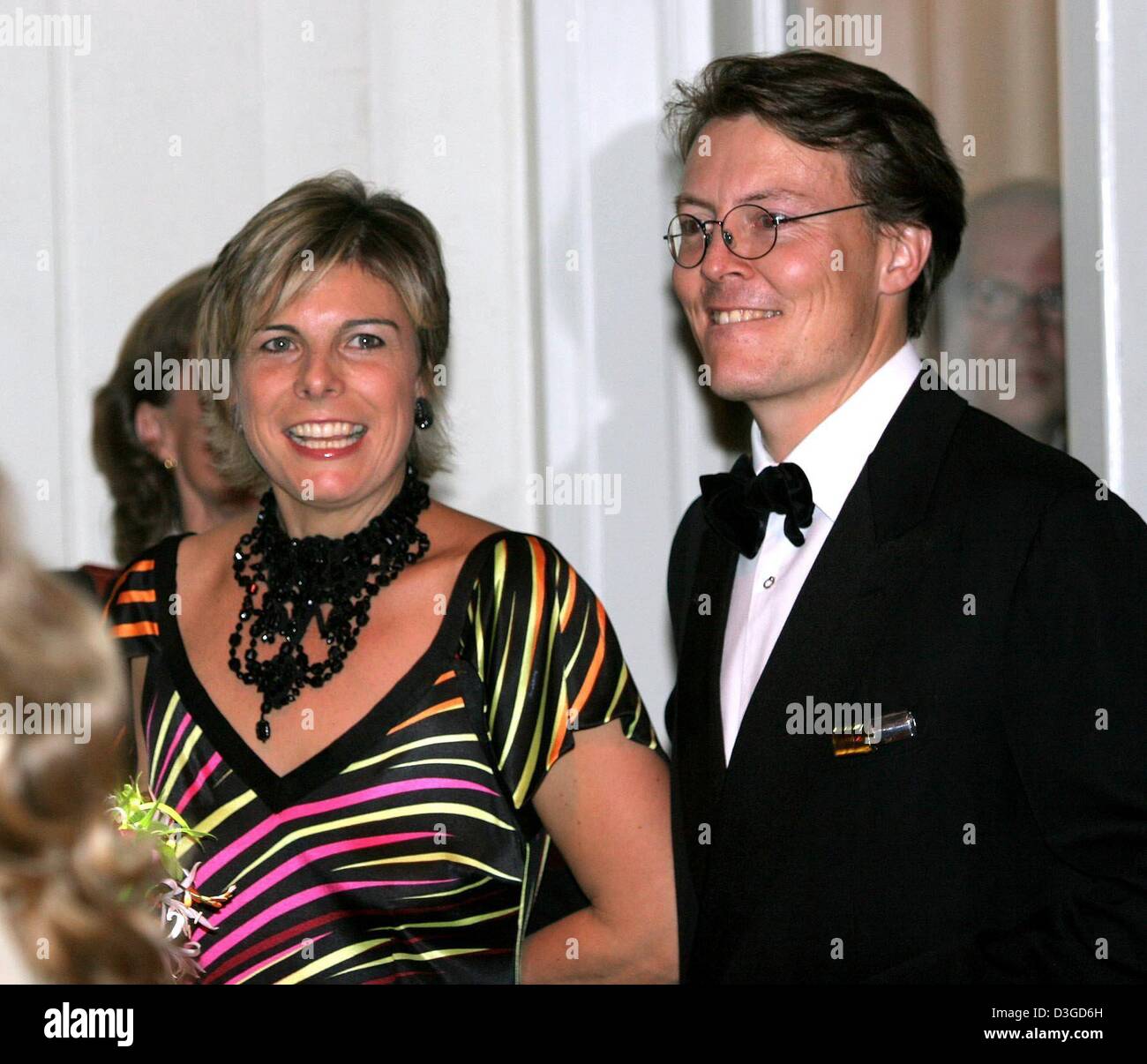 (dpa) - Princess Laurentien and Prince Constantijn of the Netherlands smile as they arrive for the opening of the Golden Children's Book Week at the theatre at the Leidseplein in Amsterdam, the Netherlands, 5 October 2004. Stock Photo