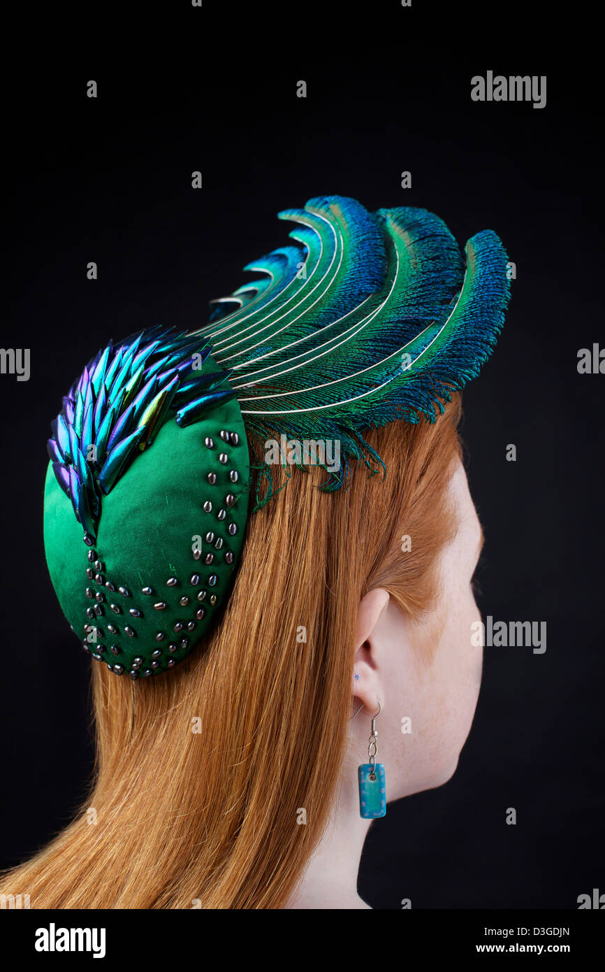 An organic hat modeled on a redhead. Handmade by Catherine Povey Milinery, Llandeilo, Carmarthenshire. Stock Photo