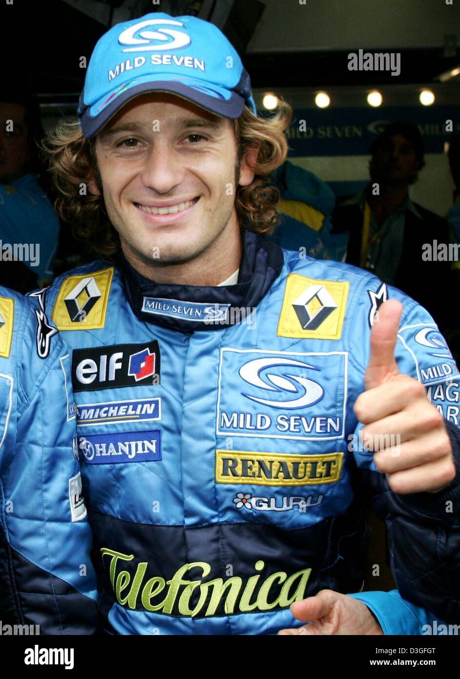 dpa files) - Italian Formula 1 driver Jarno Trulli gives a thumbs up after  a successful qualifying round for the Belgian Grand Prix in Spa, Belgium,  28 August 2004. Trulli, who was