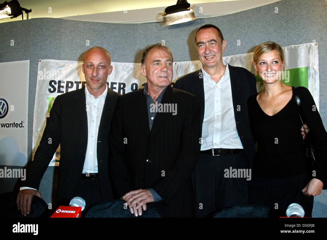 (dpa) - Director Oliver Hirschbiegel (L-R), actors Bruno Ganz and Alexandra Maria Lara and producer Bernd Eichinger arrive for the premiere of their new movie 'The Downfall - Hitler and the End of the Third Reich' at the Film Festival in Toronto, Canada, 14 September 2004. Stock Photo
