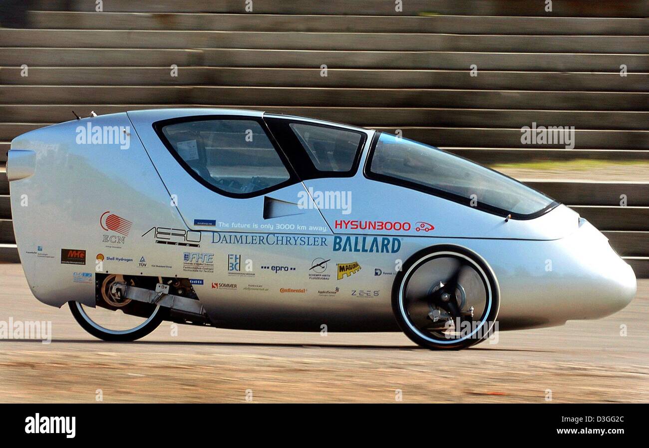 (dpa) - The hydrogen powered car 'HYSUN3000' passes a flight of stairs in Schwerin, Germany, 8 September 2004. The builders of the car intend to drive from Berlin, Germany, to Barcelona, Spain, on only 3 kg of hydrogen. The car started its 3,000 km long journey a day earlier in Berlin. The vehicle, which was designed and constructed by a non-commercial team, can go up to 80km/h and Stock Photo