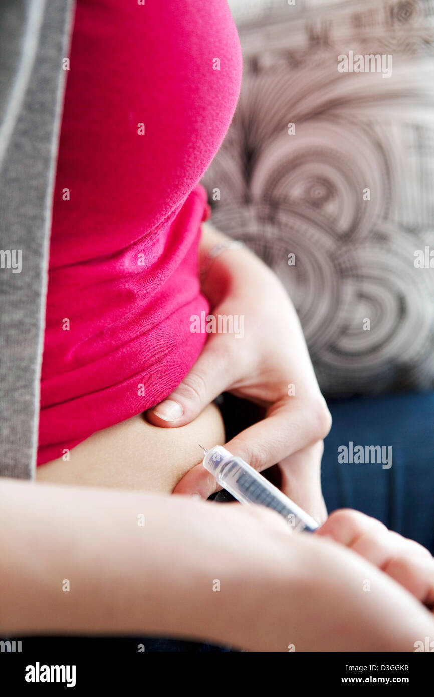 TREATING DIABETES IN A WOMAN Stock Photo
