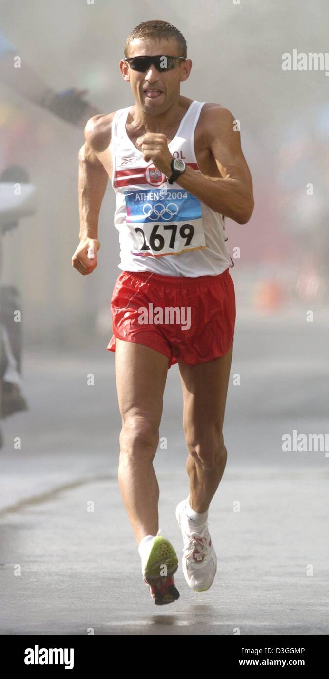 (dpa) Robert Korzeniowski from Poland on his way to win the men's 50 km walk in the streets of Athens at 2004 Olympic Games. Stock Photo